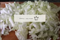 Chop Beijing cabbage. ...