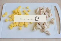 Cut the chicken meat and hard cheese into small cu...