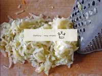 Grate the cooked potatoes over a coarse grater. ...