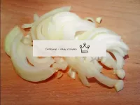 Cut the onions into half rings. ...