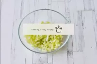 Wash the celery stems, dry and cut into small cube...
