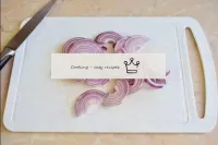 Peel the onions and rinse in cold water. Then cut ...