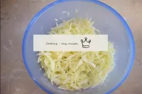 Fold the chopped cabbage into a spacious bowl, sal...