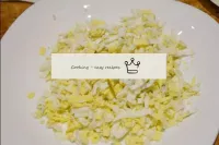 Grate the boiled eggs over a coarse grater. . . ...