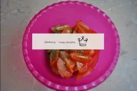 Place the tomatoes in a bowl to make the salad. Ad...