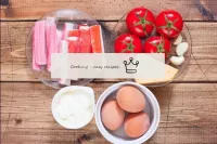 How to make a salad from crab sticks, tomatoes, eg...