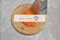 Wash the carrots well under running water with a b...