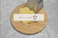 Grate the cheese on the same medium grater. ...