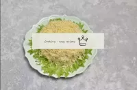 Sprinkle the salad with grated cheese, slightly im...