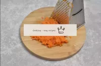 Grate the carrots on a medium grater - then the sa...