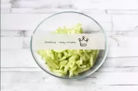 Wash the cucumber, peel and cut into strips. For t...