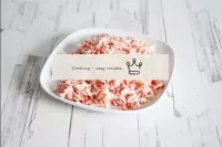 Grate crab sticks on a medium grater. Approximatel...