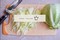 Finely chop the young cabbage and remember a littl...