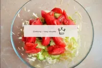 Add the chopped tomatoes to the salad bowl. ...