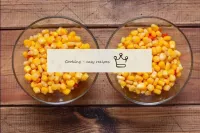 Gently open the tin of canned corn to drain the li...