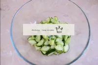 Cut the tails on both sides of the cucumber. Cut t...