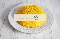 Place the grains of canned corn tightly on top of ...