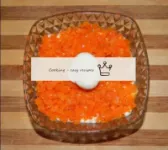 Grate the boiled carrots on a coarse grater, put i...