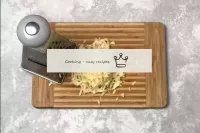 We rub cheese on a coarse grater. ...