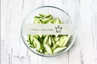 Wash and dry the cucumber. Cut into strips. The sk...