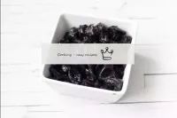 Wash the prunes, dry and cut into pieces. If the p...