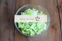 Wash the Beijing cabbage, dry and cut into small p...