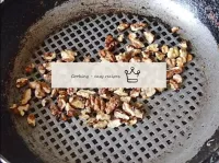 Fry the walnuts lightly in a dry, hot pan. ...