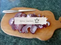 We shink onions in half rings. Fry in a pan until ...