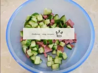 Cut the fresh cucumbers into medium cubes (about t...