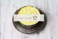 Another layer is grated yolks. I immediately rubbe...