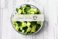 Wash and dry the cucumber. Cut into small cubes. T...