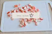 Release the crab sticks from packaging and cut int...