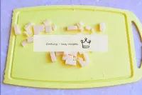 Cut the cheese into small cubes, about the same si...