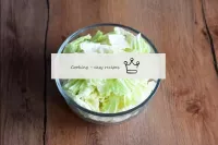 Wash the Beijing cabbage, dry and cut into medium ...