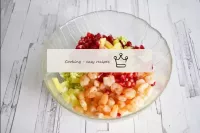 In a salad bowl, combine Beijing cabbage, shrimp, ...