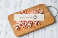 Cut crab sticks into small cubes. You shouldn't cu...