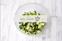 Wash the cucumbers and cut into small cubes. If th...