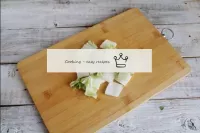 Cut the Beijing cabbage into large squares or tear...