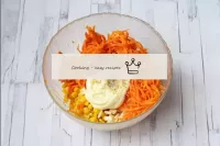 In a bowl, combine eggs, Korean carrots, cheese an...