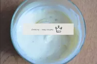 Make the sauce. Mix mayonnaise and sour cream in a...