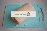 Then twist the lard into a roll. Wrap the roll in ...