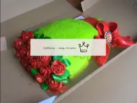 Cake with mastic bow bouquet of roses...