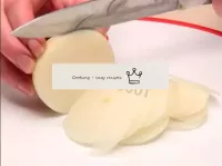 Clean the onions and cut into thin rings. ...