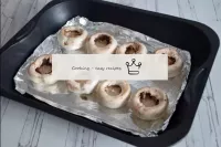 Put mushroom hats in a ceramic baking dish or on a...