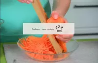 Take a grater for Korean carrots and rub one mediu...