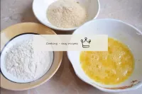 Prepare three bowls for breading. Pour flour into ...