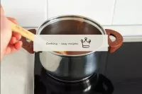 Without stopping stirring, bring the chocolate mas...