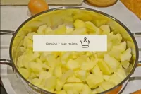 In a pan, melt butter, cut apples with a middle cu...