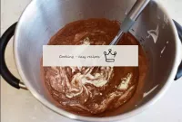 Stir in flour, starch, cocoa and soda by hand, whi...