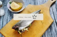 Pour the squeezed lemon juice over the fish from t...